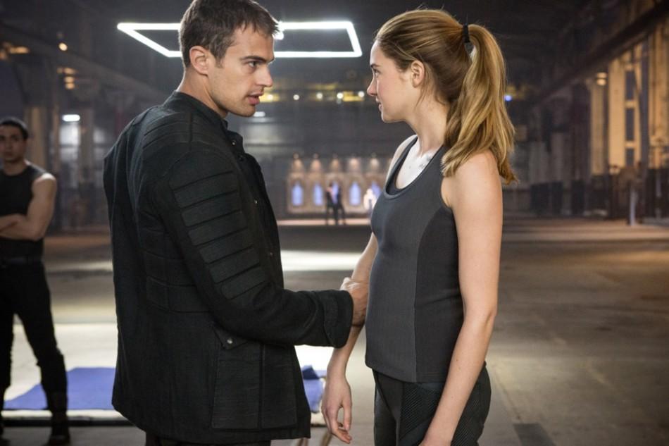 Four (Theo James) gives Tris (Shailene Woodly) a quick pep talk before fighting a fellow initiate. 