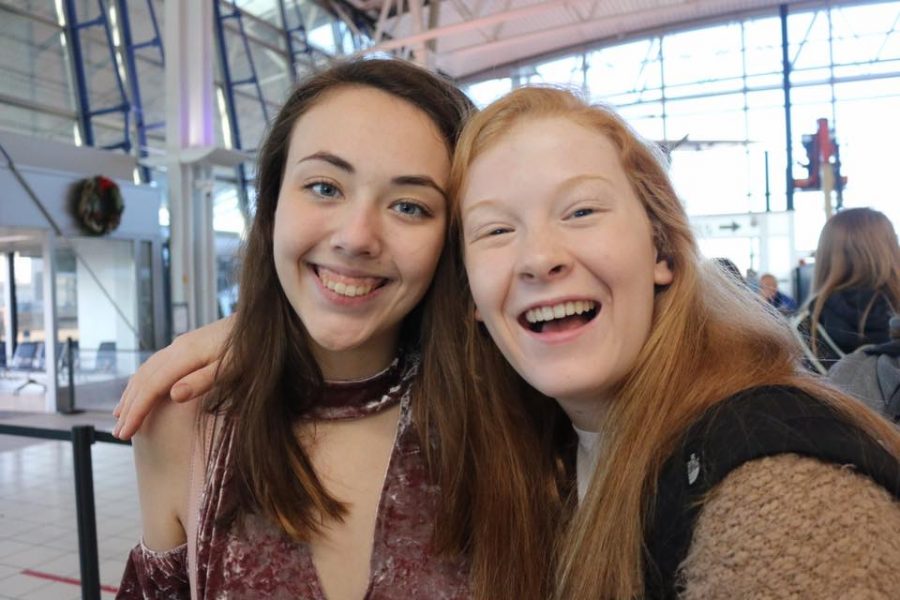 Jessica Belle Kramer (12) and Natalie Evans (11) waiting for the plane.