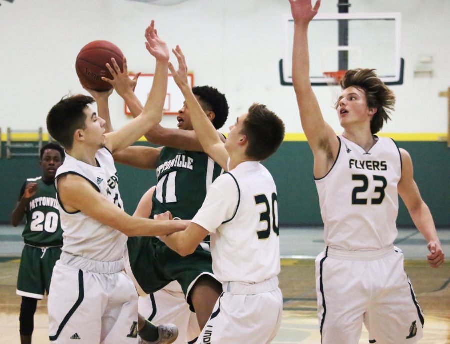 [JV Players] Brendan Ludwig (10, #2), Evan Knobbe (10, #30) and Joey Abeln (10, #23)
