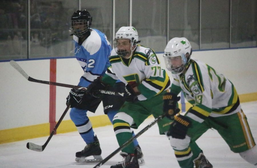 Rusty Hess (10, #77) and Jake Blessing (11, #23)