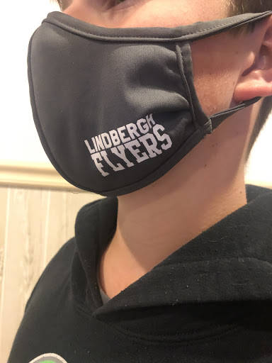 Lindbergh Flyers mask worn by Lindbergh soccer player Nathan Ottens (9) allows student athletes to stay safe during practices and games while showing school spirit. The mask, now discontinued, found on the Lindbergh Flyerette Store.