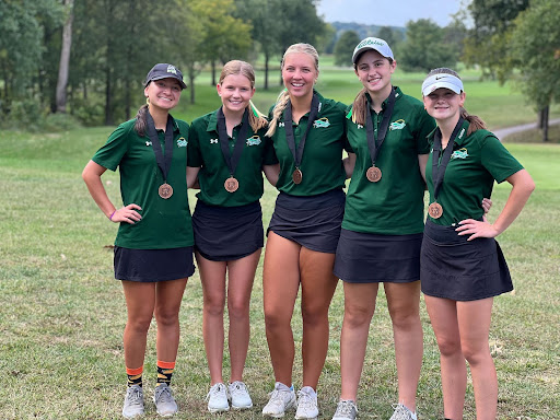 Pictured from left to right: Mila Snowert (12), Reese Reinhardt (11), Audrey Scarpace (11), Madison Keating (9), Brooke McKenney (12). The 5 competitors at conference at Crescent Farms on Tuesday, October 3rd with their medals for placing in the top 15 in the whole tournament. 
