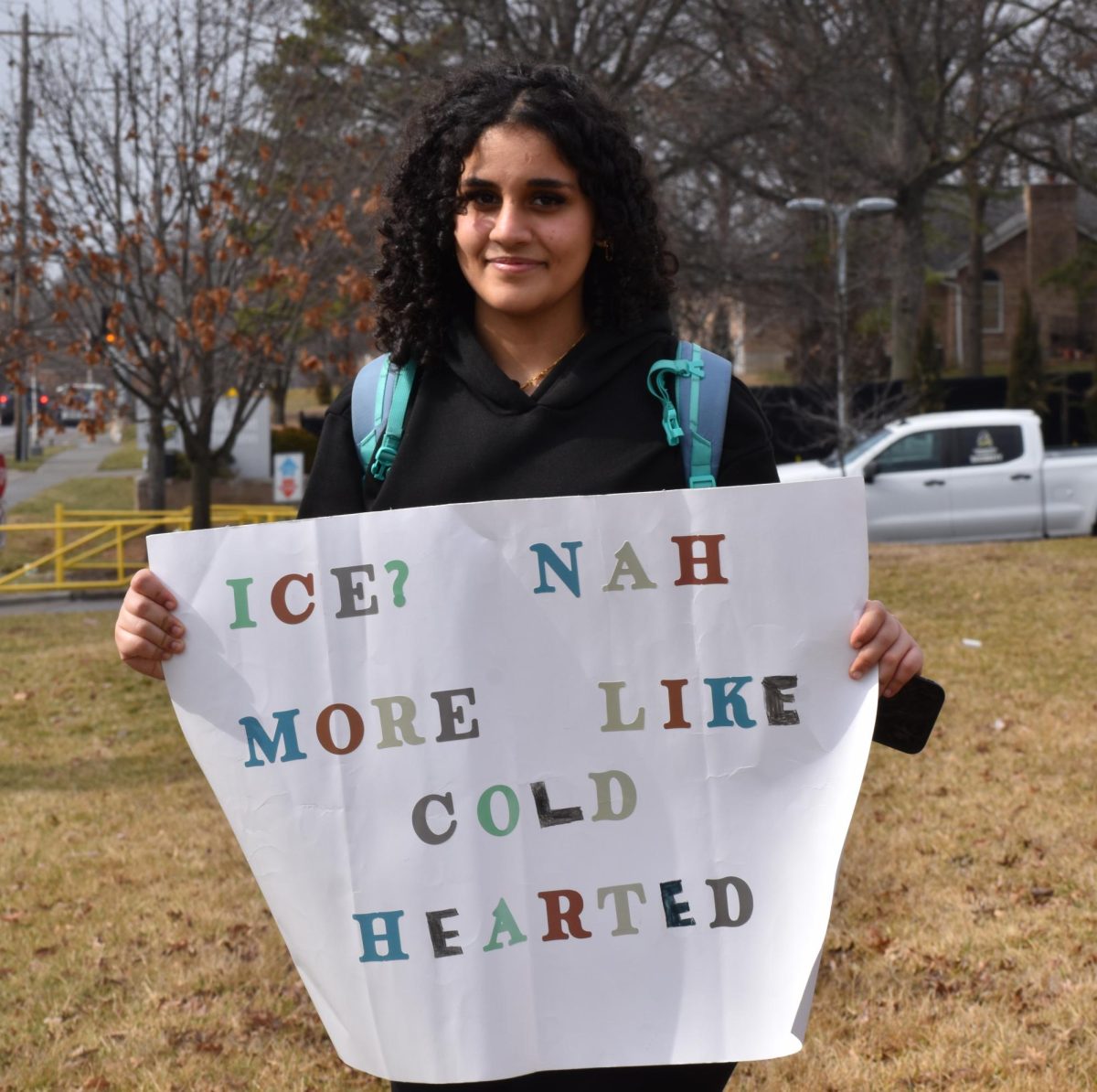 A Lindbergh freshman holds up a sign saying, "Ice? Nah more like cold hearted"